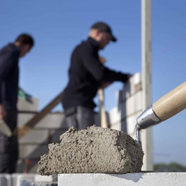 Bricklayer laying bricks.If you want more images with building activity please click here.